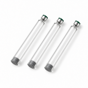 Three empty clear laboratory cartridges with gray plungers and silver closures on a white background.